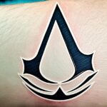 assassin's creed symbol tattoo